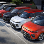a fleet of Kia SUVs